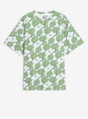 Puma Bílo-zelené dámské vzorované tričko Puma ESS+ Blossom AOP Tee XS