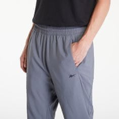 Reebok Kalhoty Id Train Woven Pant Grey XL Šedá