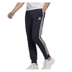 Adidas Kalhoty na trenínk tmavomodré 170 - 175 cm/M Essentials Tapered Cuff 3 Stripes