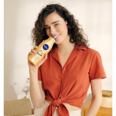 Nivea Tónovací tělové mléko Sun Touch (Body Lotion) 400 ml