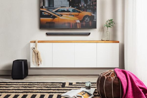 moderný elegantný soudbar so subwooferom polk audio magnifi 2 výkon 200 w Bluetooth chromecast wifi pripojenie voice adjust pre čisté dialógy hdmi s arc optický diaľkový ovládač google assistant hlasové ovládanie priestorový 5.1 zvuk dolby digital sda dts inštalácia aj na stenu miestnosti 4k hd televízory režimy film hudba šport nočný režim nízky profil bezdrôtový subwoofer