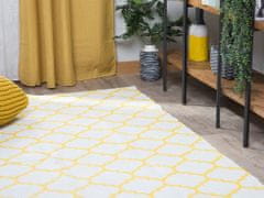 Beliani Kanárkově žlutý oboustranný koberec s geometrickým vzorem 140x200 cm AKSU