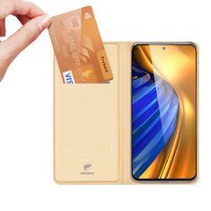 Dux Ducis Skin Pro knížkové kožené pouzdro na Xiaomi Poco F4 5G, zlaté