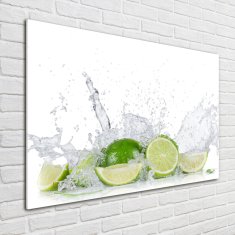 Wallmuralia Foto obraz skleněný horizontální Limetky a voda 100x70 cm 2 úchytky