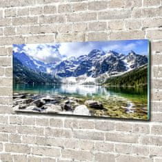 Wallmuralia Foto obraz fotografie na skle Mořské oko Tatry 100x50 cm 2 úchytky