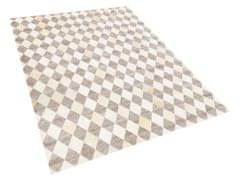 Beliani Kožený koberec béžovo-hnědý 140 x 200 cm SESLICE