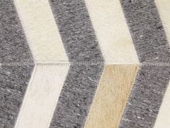 Beliani Kožený koberec v šedé a béžové barvě 140 x 200 cm BAGGOZE