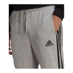 Adidas Kalhoty na trenínk šedé 164 - 169 cm/S Essentials Fleece Tapered Cuff 3STRIPES