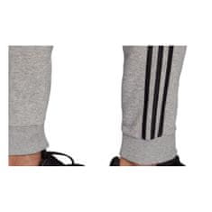 Adidas Kalhoty na trenínk šedé 164 - 169 cm/S Essentials Fleece Tapered Cuff 3STRIPES