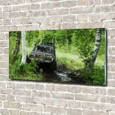 Wallmuralia Foto-obraz fotografie na skle Jeep v lese 140x70 cm 2 úchytky