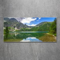 Wallmuralia Foto obraz fotografie na skle Mořské oko Tatry 125x50 cm 4 úchytky